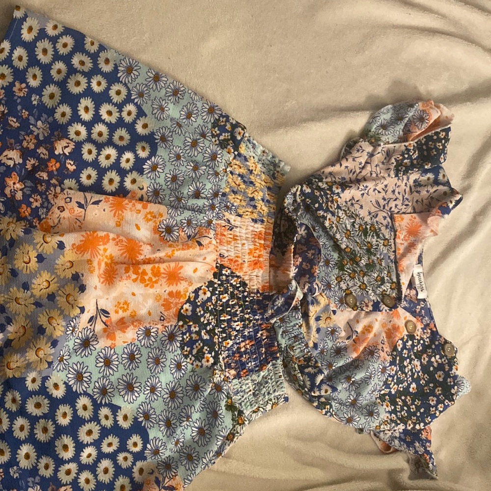 This outfit is made out of 97% polyester and 3% of spandex and it is size 10.